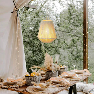 8-inch woven hemp rope hanging lamp, battery-powered with warm ambient light.