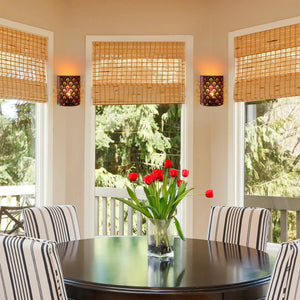 Set of 2 wall sconce lamps, black metal with decorative perforated pattern, battery-operated