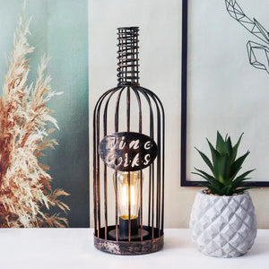 Cordless metal wine cork lamp with cage-style frame and Edison bulb, bronze finish, 13.5 inches tall