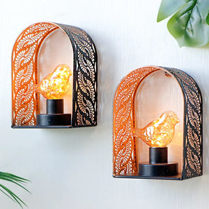 Set of 2 bird-bulb wall sconces by JHY DESIGN with lace metal frames and warm amber fairy lights.