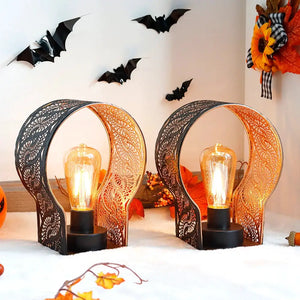 Set of 2 JHY DESIGN 7 in wall sconce battery-operated lamps with dark lace metal frames and Edison bulbs.