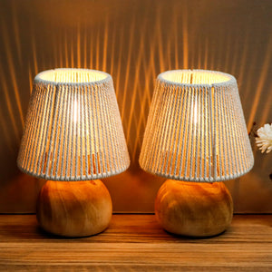 Set of 2 woven cotton rope table lamps with natural beige rope shades and warm glow