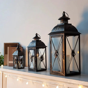Set of 3 black metal and glass hanging candle lanterns, 19in, 13.5in and 9.5in, JHY DESIGN.