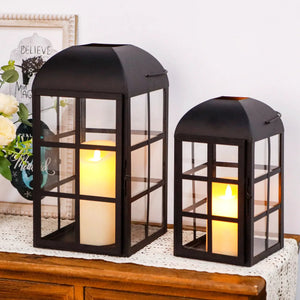 Set of 2 JHY DESIGN decorative candle lanterns, black metal with glass panels, 10.5 and 14 inch tall, lit candles