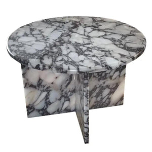 Calacatta Viola marble round coffee table with a polished white top, gray veining, and square legs.