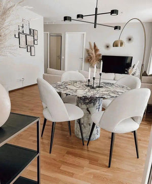 Calacatta Viola round marble dining table by Villohome with pedestal base, 48-inch diameter, 30-inch height.
