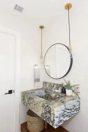 Calacatta Viola marble rectangular wall-mount bathroom sink by Villohome with 8-inch backsplash.