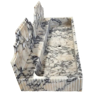 Calacatta Viola marble wall-mount bathroom sink with fluted backsplash