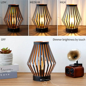 Set of 2 dimmable bedside table lamps with black metal cage frames and warm glow