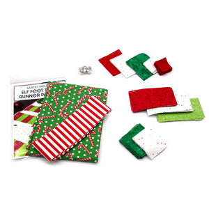 Elf Feet Christmas Table Runner Precut Quilt Kit; red, green and white fabrics