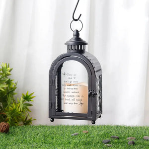 11'' black memorial lantern with automatic timer, hanging metal frame and glass panels