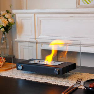 Rectangular 14in tabletop fire bowl with clear glass windscreen and dark base, gel/ethanol flame
