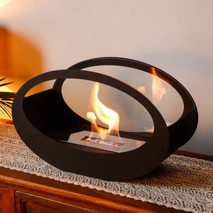 16x9.5-inch black metal tabletop fireplace with circular ring frame and open flame