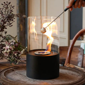 11.5inch Tabletop Fire Bowl by JHY DESIGN, glass enclosure over black base with a radiant flame.