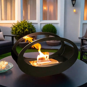 JHY DESIGN 16x9.5 in black metal tabletop fireplace with concentric rings and gel fuel