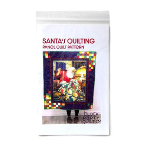Quilting Santa Panel Quilt Pattern by Block Party Quilt Co for an easy throw quilt.