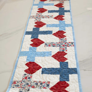 Favorite Things Precut Table Runner Bundle by Block Party Quilt Co; white with red leaf shapes and blue blocks