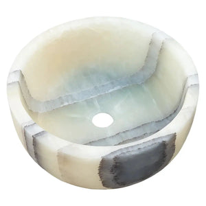 Bathroom vanity vessel sink in green translucent onyx.
