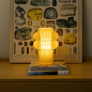 Oppi Table Lamp by Terra Labs, yellow ribbed glass shade with warm glow