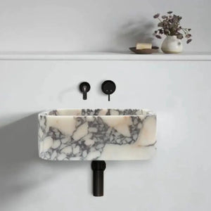 Calacatta Viola marble rectangular wall-mount bathroom sink with black faucet and exposed drain