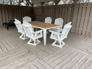 Java Leg Outdoor Dining Table with natural wood top and white base, surrounded by white Adirondack chairs on deck