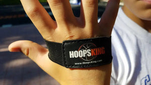 HoopsKing palm dribbling aid (pair) black elastic strap on hand with HoopsKing logo.