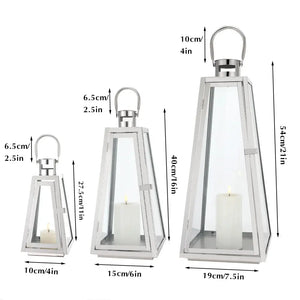 Set of 3 stainless steel decorative candle lanterns by JHY DESIGN; 11, 16, and 21 inches tall with glass panels.
