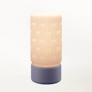 Liunk Table Lamp with a peach textured shade and blue base