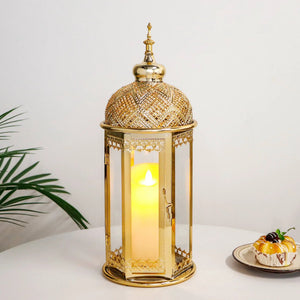 Moroccan gold hexagonal candle lantern with intricate lattice dome and glass panels, 15 inches tall, elegant finish.