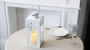 Set of 3 white metal candle lanterns with glass panels and handles (12/15/19in)
