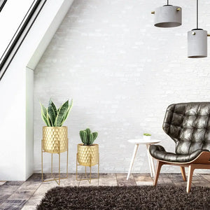 Flowerpots set of 2: golden honeycomb-embossed pots on metal stands, 12" and 18" tall.