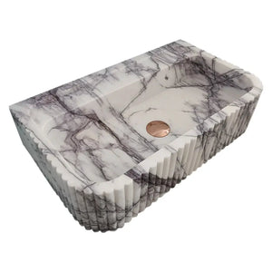 New York Marble wall-mount stone sink, ribbed exterior, white with gray veining, copper drain