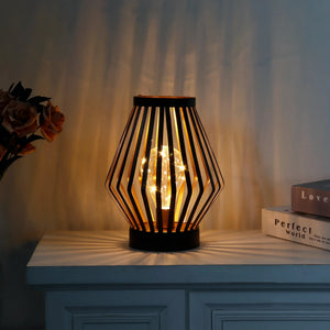 8.7in tall battery-powered table lamp Diamond by JHY DESIGN; metal cage frame with warm light