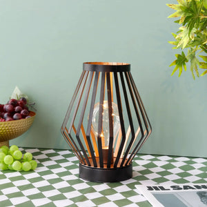 8.7-inch tall battery-powered table lamp Diamond; black metal wireframe with warm glow.