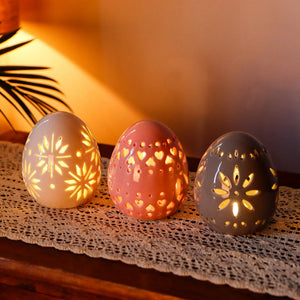 Set of 3 JHY DESIGN ceramic decorative lamp eggs, 4 in tall, with carved cutouts and warm glow