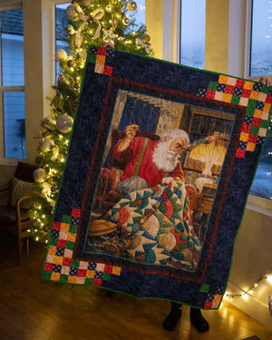 Quilting Santa Panel Quilt Pattern by Block Party Quilt Co; Santa panel with colorful patchwork border.