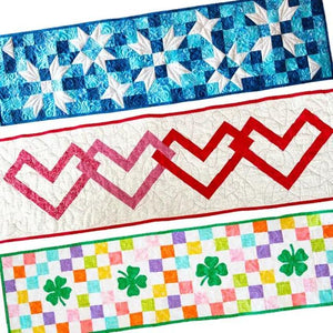 Seasonal Quilted Table Runner Kit Bundle, Winter/Spring; three-panel design with blue star blocks and pink zigzag.