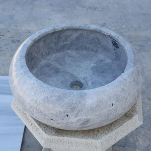 Stone sink Sirius Silver Marble circular above-counter bathroom basin on a beige pedestal