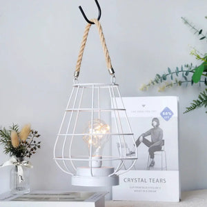 8.5-inch tall cordless accent light by JHY DESIGN with white wire cage and Edison-style bulb.