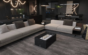 Black marble coffee table with built-in fireplace by MEG Custom Marble by Ziynet A. LLC in a modern living room.