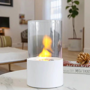 Round white portable tabletop fireplace with glass cylinder by JHY DESIGN