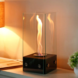 Rectangular glass tabletop bioethanol firepit by JHY DESIGN; black base with glass panels and visible flame.
