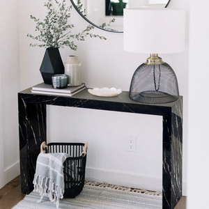 Toros black marble rectangular console table with a polished finish, 40in long by 12in wide