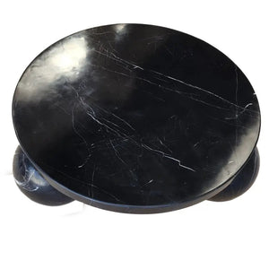 Toros black marble round coffee table with spherical legs