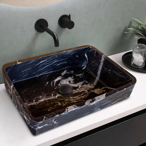 Toros black marble rectangular above-counter bathroom sink with brown edges and matte-black wall faucet