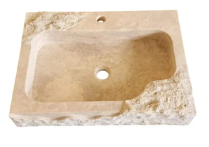 Beige travertine stone rectangular wall-mount bathroom sink with rustic, rough edges.