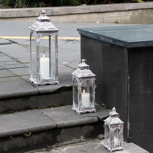 Decorative candle lanterns set, cement-gray metal with vintage design by JHY DESIGN; includes 10, 14, and 19.5 in heights.