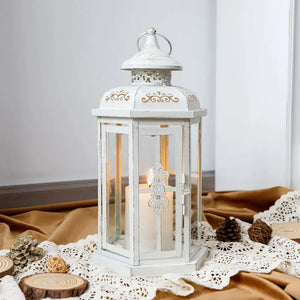 12-inch tall candle lantern, white with gold brush finish, vintage metal decorative lantern with lit candle.