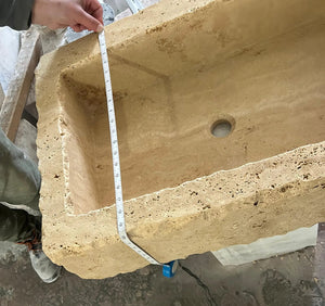 Walnut Travertine Rustic rectangular wall-mount bathroom sink by Villohome; beige textured stone with drain hole and measuring tape for scale.