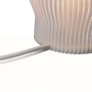 Yuji table lamp by Terra Labs; frosted ribbed glass base with gray cord